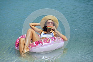Woman in the Sea on a Rubber Ring.