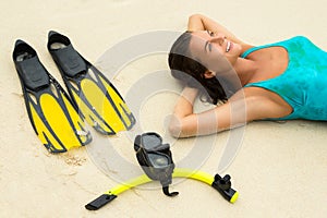 Woman in the sea during snorkeling in blue water