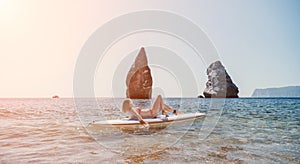 Woman sea sup. Close up portrait of happy young caucasian woman with blond hair looking at camera and smiling. Cute