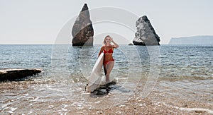 Woman sea sup. Close up portrait of happy young caucasian woman with blond hair looking at camera and smiling. Cute