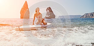 Woman sea sup. Close up portrait of happy young caucasian woman with blond hair looking at camera and smiling. Cute