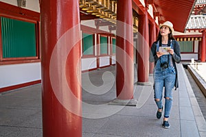 Woman searching for destination by guide map