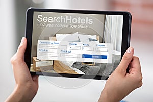 Woman Searching Online Low Priced Hotels