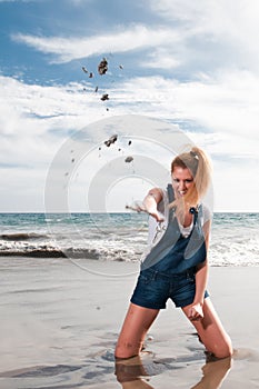 Woman at the seaside laughing