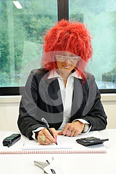 Woman secretary with red hair