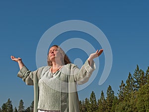 Woman seeking blessing photo
