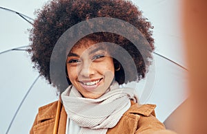 Woman, selfie closeup and umbrella in rain, water or drizzle in portrait, happiness and smile. Black woman, hair or afro