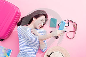 Woman selfie happily on floor