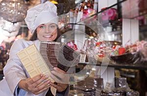 Woman selling chocolates and confectionery