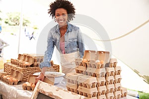 Woman Selling Fresh Eggs At Farmers Food Market