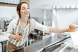 Woman selling ice cream in the shop