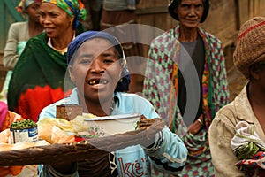 Woman selling pepper