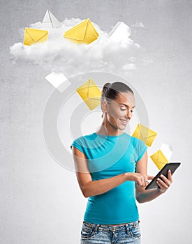 Woman sending data to a cloud