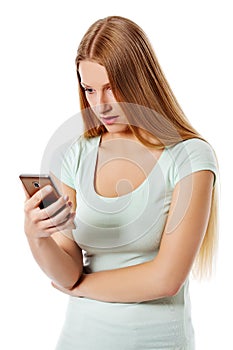 Woman sending a sms on cell phone, isolated on white.
