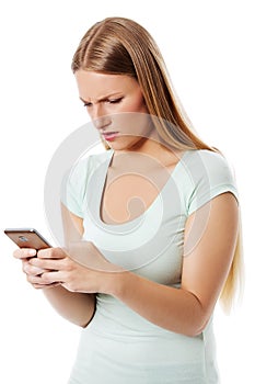 Woman sending a sms on cell phone, isolated on white.