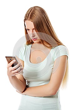 Woman sending a sms on cell phone, isolated on white.