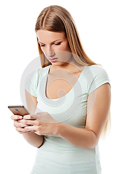 Woman sending a sms on cell phone, isolated on white.