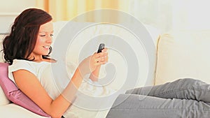 Woman sending text messages