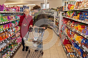 Woman and senior woman going for shopping in the supermarket