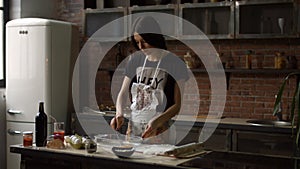 Woman separating egg whites and egg yolks