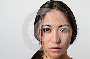 Woman with serious blank stare