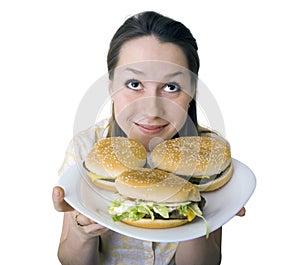 Woman serving cheeseburgers