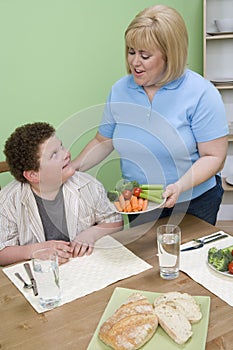 Woman Serving Vegetables