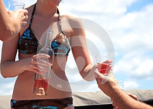 Woman serving wine on a boat