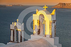 Woman shadow silhouette on the belltower, Santorini