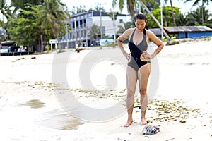 Woman shape huge pretty with bikini black on beach