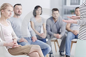 Woman during sharing session photo