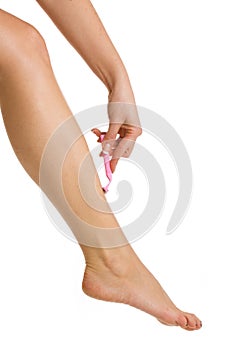 Woman shaving legs