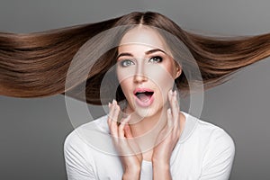 woman with shiny straight long hair.