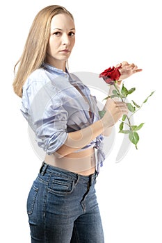 Woman in shirt hold one red rose.