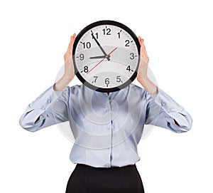 Woman in a shirt holds a round clock