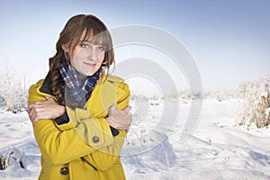 Woman Shivering on a cold winter day photo