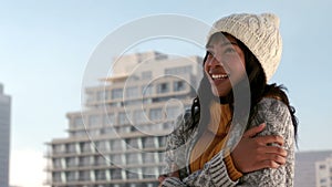 Woman shivering on a winters day