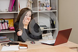 Woman shock in front of computer