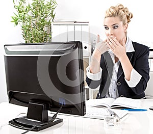 Woman shocked computer crash at office.