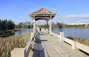 Woman shooting Anping Stone Bridge, adobe rgb