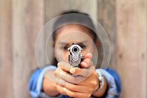Woman at the shooting range shot from a revolvers
