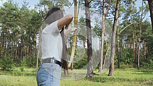 Woman shoots an arrow and missed