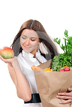 Woman shopping bag full of vegetarian groceries