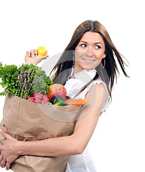 Woman with shopping bag with vegetables and fruits