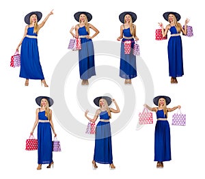 The woman with shopping bags isolated on white