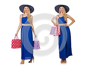 The woman with shopping bags isolated on white