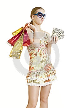 Woman with shopping bags and money