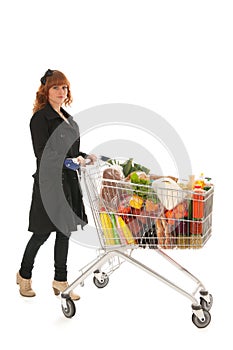 Woman with Shopping cart full dairy grocery