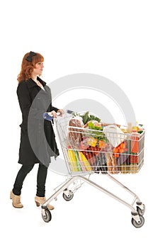 Woman with Shopping cart full dairy grocery