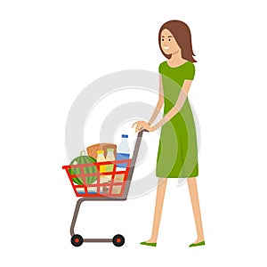 Woman and shopping cart with products. Health food. Supermarket trolley